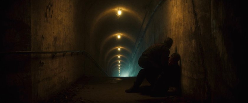 Daredevil and Bullseye in a tunnel under the restaurant.