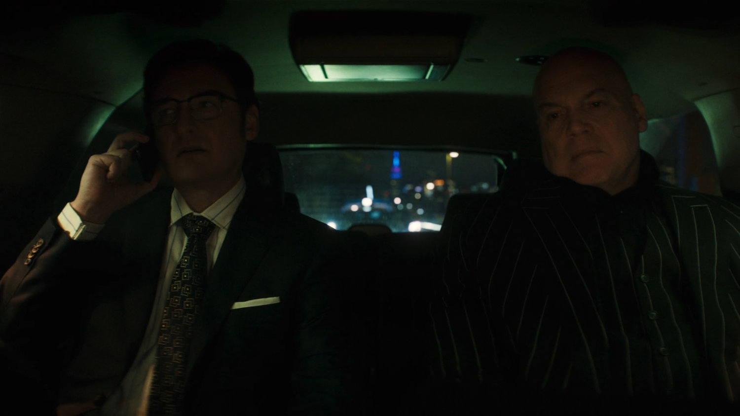 Flashback of Wesley and Fisk in the backseat of an SUV.
