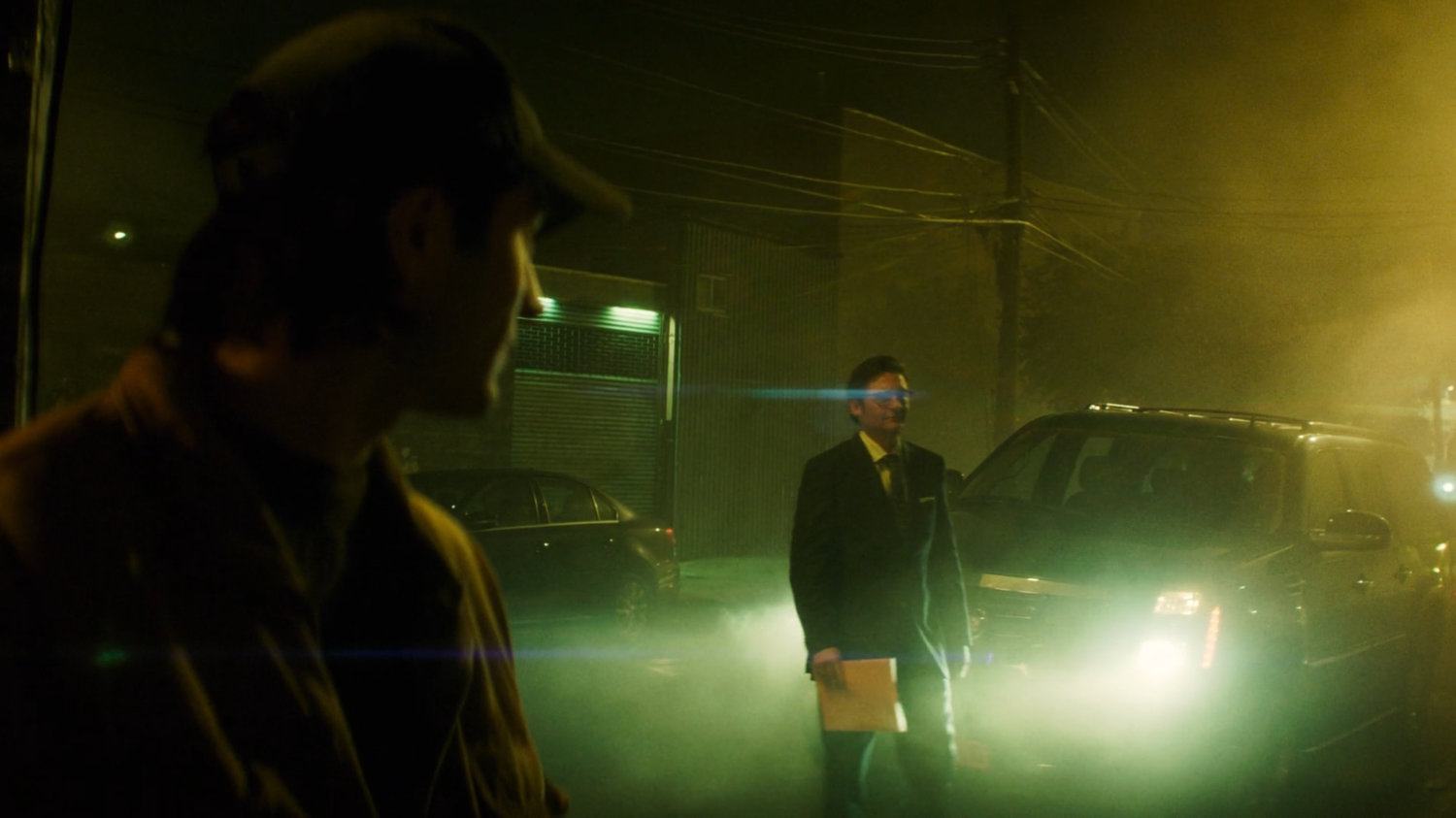 Flashback of Wesley approaching Buck with an envelope.