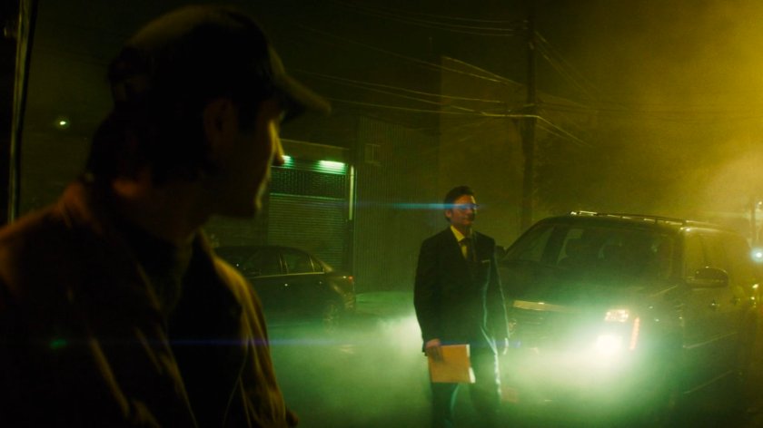 Flashback of Wesley approaching Buck with an envelope.