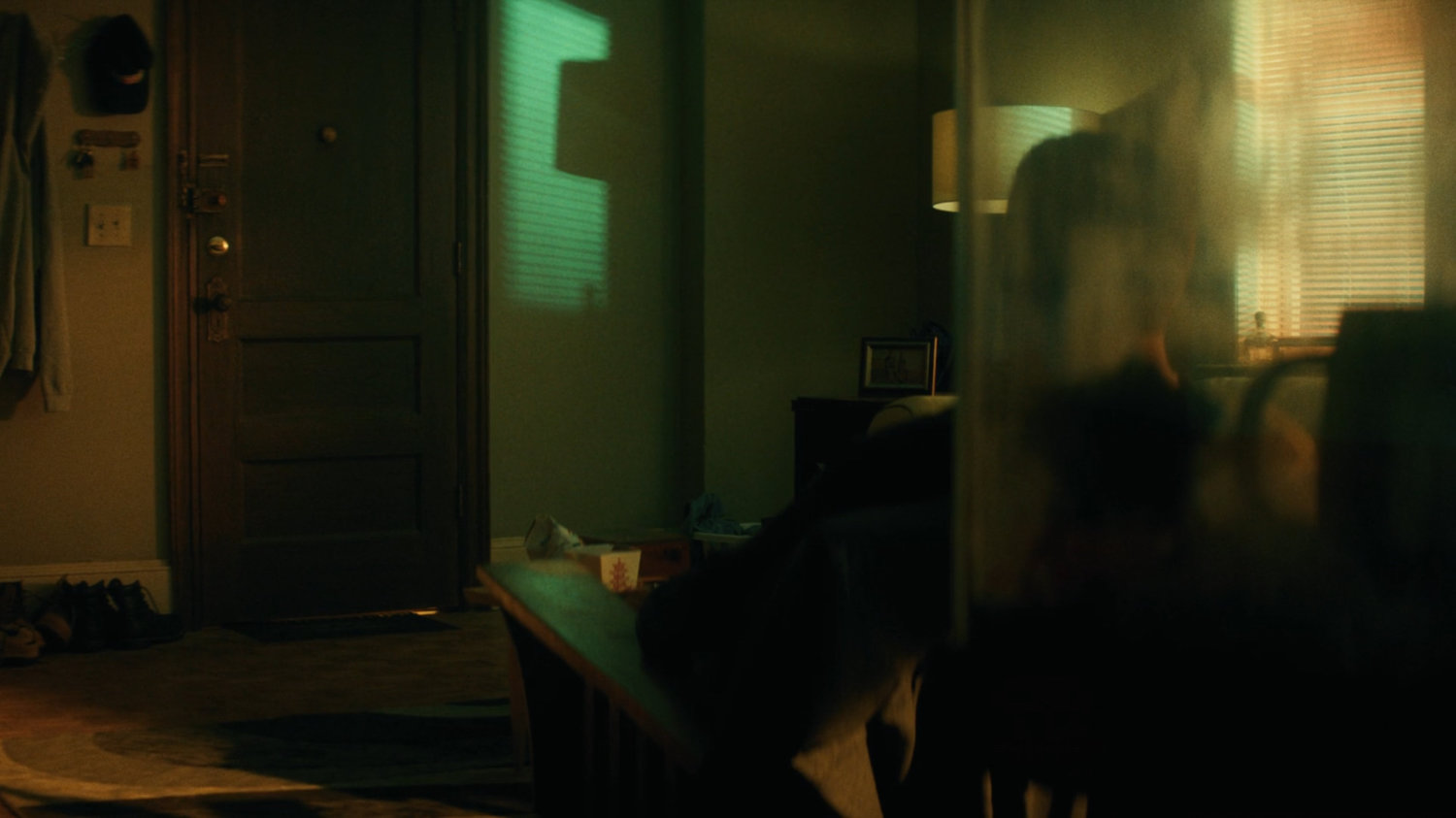 Flashback of Lionel in his apartment.