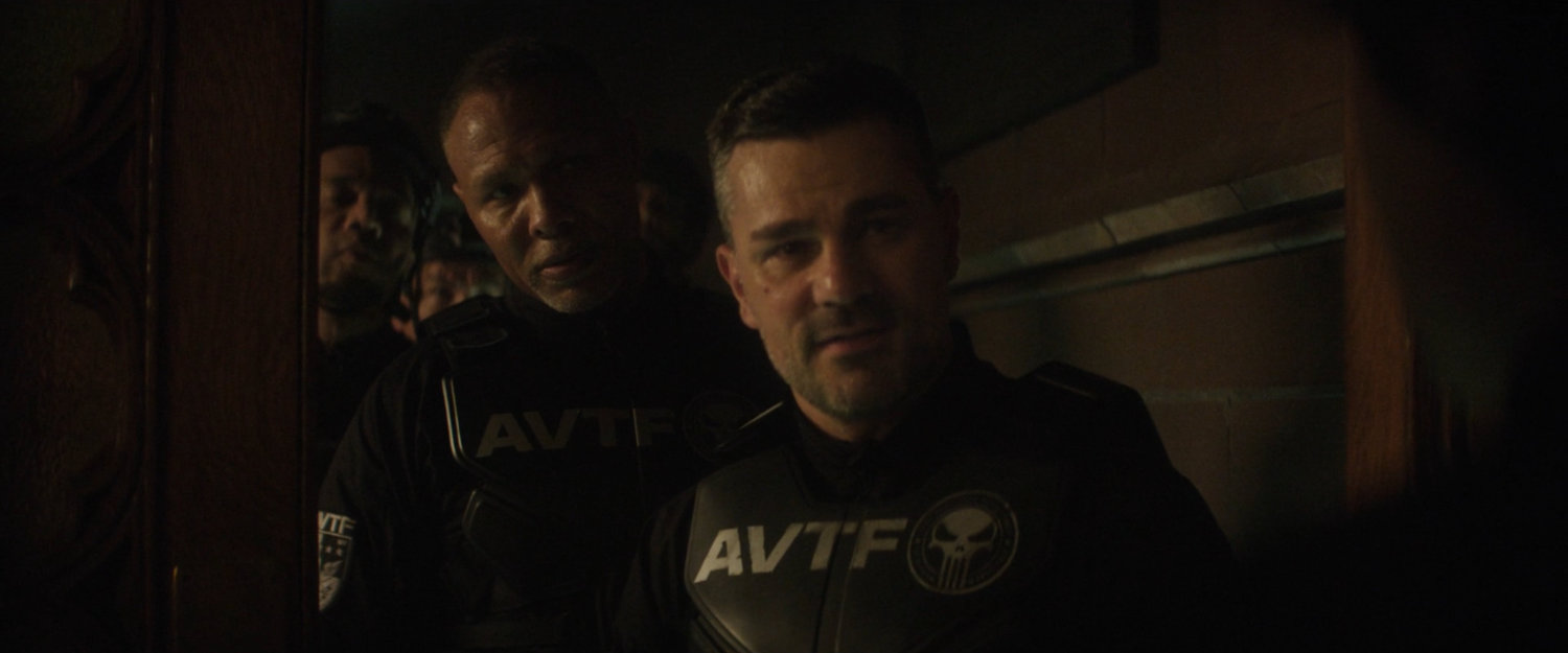 The AVTF, featuring Powell and Cole, arrive at the door to Clinton Church.