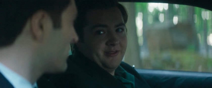 Daniel and Buck in a car in the woods.