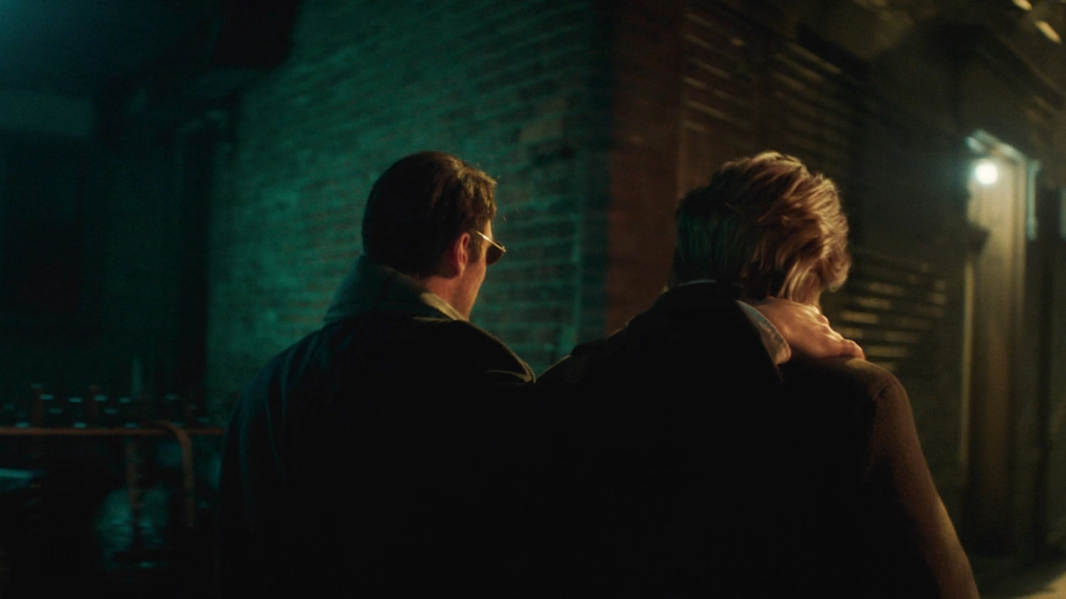 Flashback of Foggy and Matt on the sidewalk outside Lionel's apartment building.