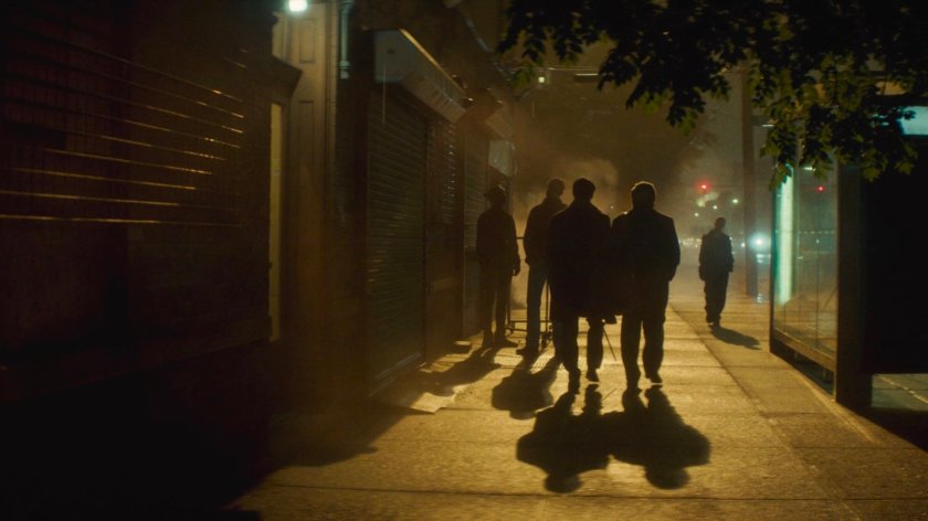 Flashback of Foggy and Matt on the sidewalk outside Lionel's apartment building.