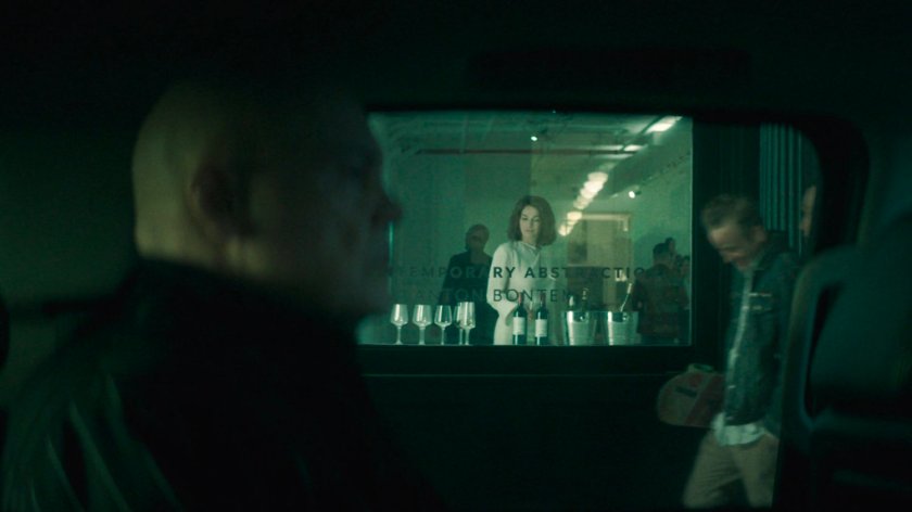 Flashback of of Fisk watching Vanessa in her gallery.