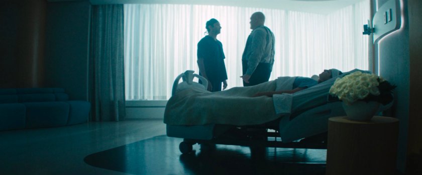 Dr. Merati and Wilson Fisk in Vanessa's room at Metro-General Hospital.