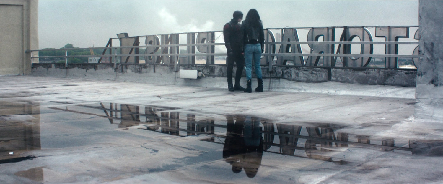 Matt and Jessica on a Storage Plus rooftop overlooking AVTF warehouse.