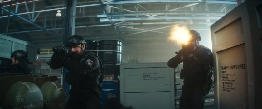 AVTF officers in a weapons storage warehouse.