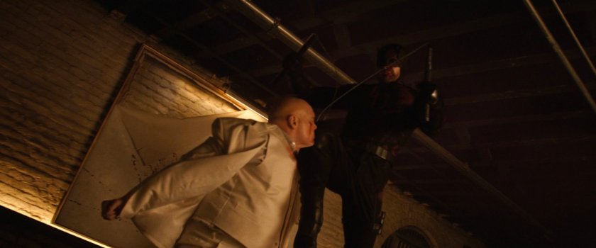 Daredevil and Fisk fighting in his dungeon.