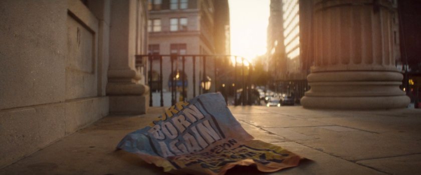 A crumpled poster outside City Hall.