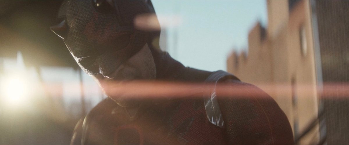 Daredevil listening to reports of riots at City Hall the next morning.