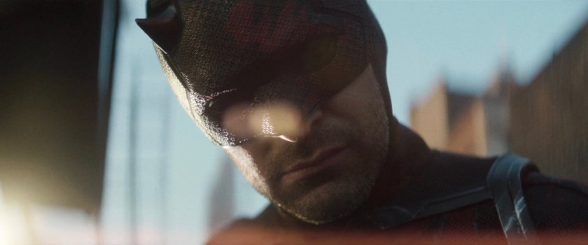 Daredevil listening to reports of riots at City Hall the next morning.