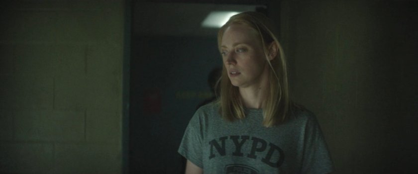 Karen in a holding cell at the 15th Precinct.