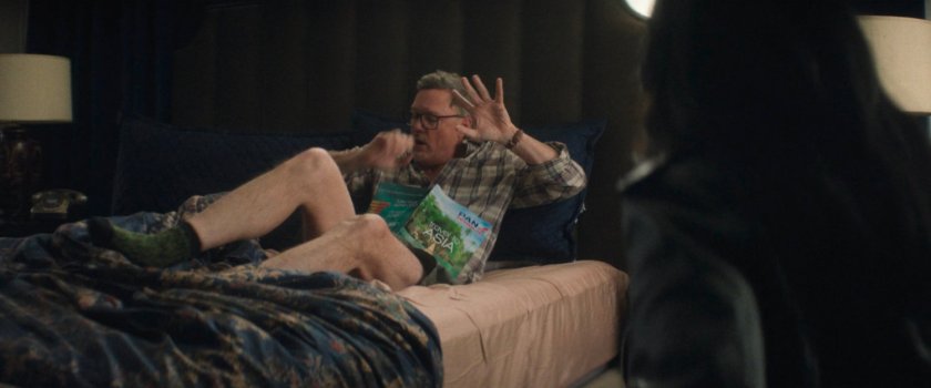 Mr. Charles's is confronted by Jessica Jones in his apartment.