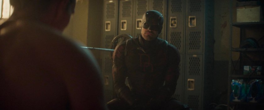 Daredevil offers Bullseye a deal in Frank Castle's old hideout.
