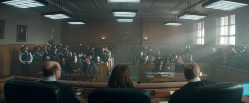 A crowded city courtroom.
