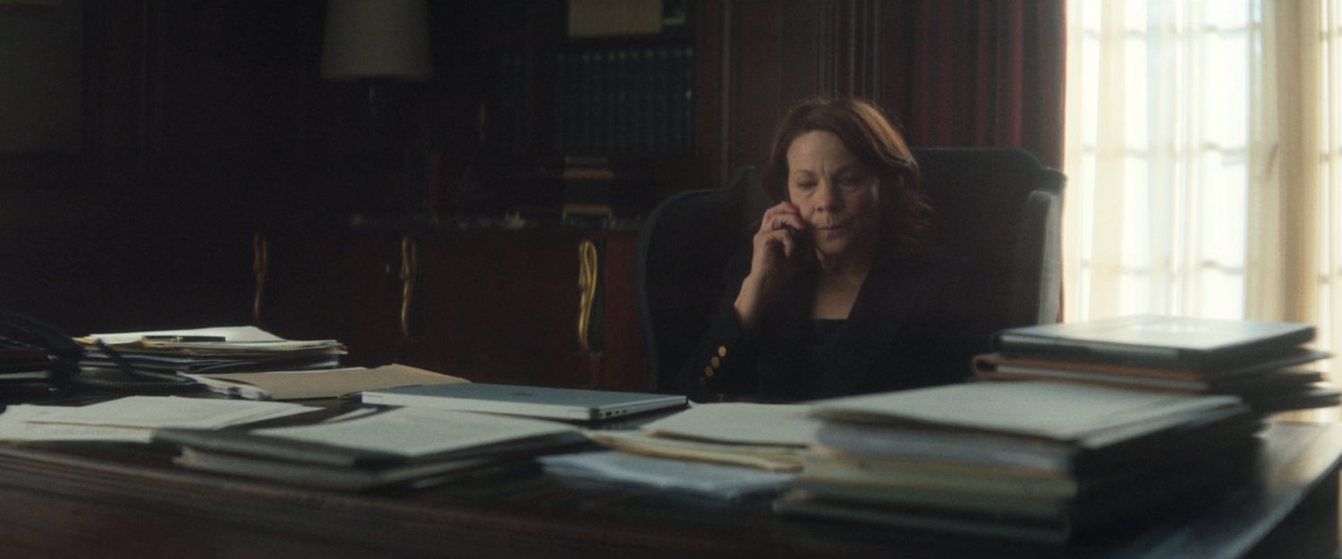 Governor McCaffrey on the phone in her mansion office.