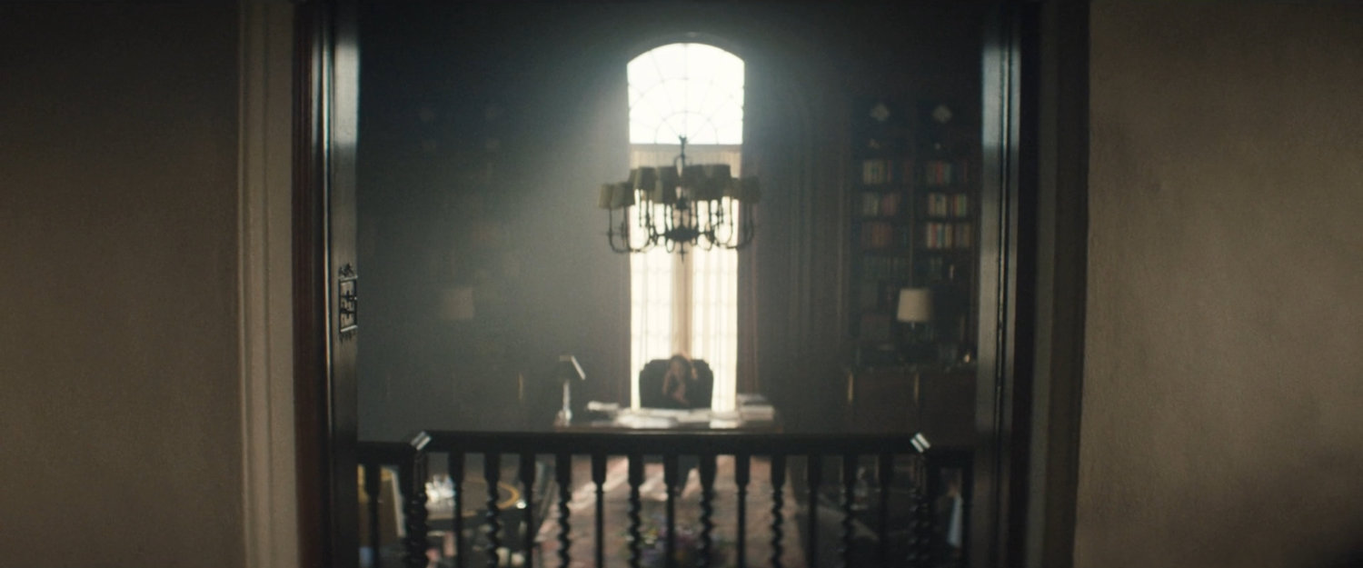 Governor McCaffrey on the phone in her mansion office.