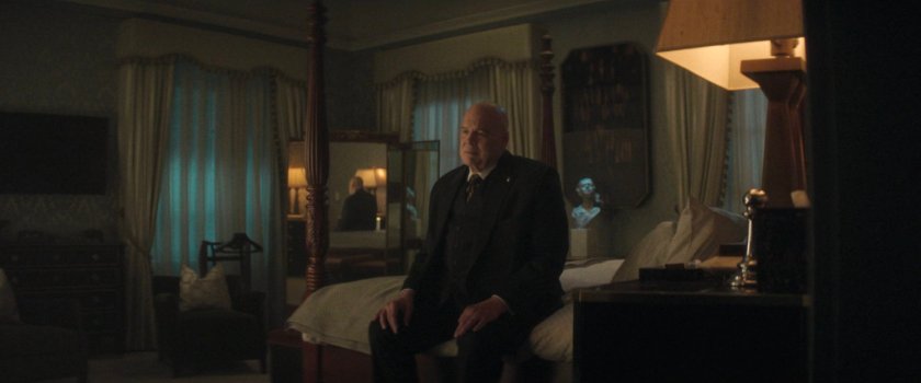 Wilson Fisk sitting in his bedroom.
