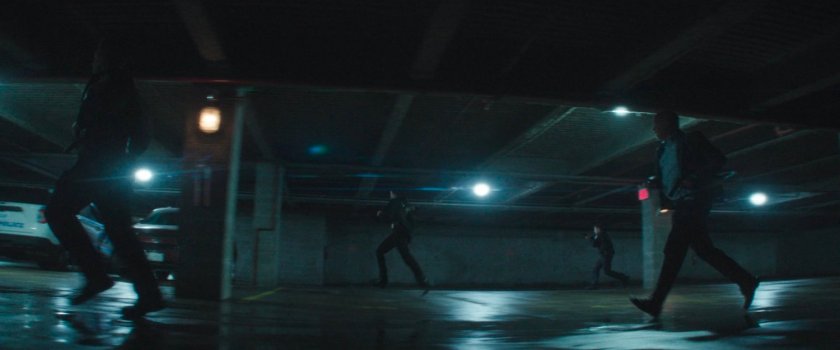 Police officers in the underground parking level at the City Courthouse.