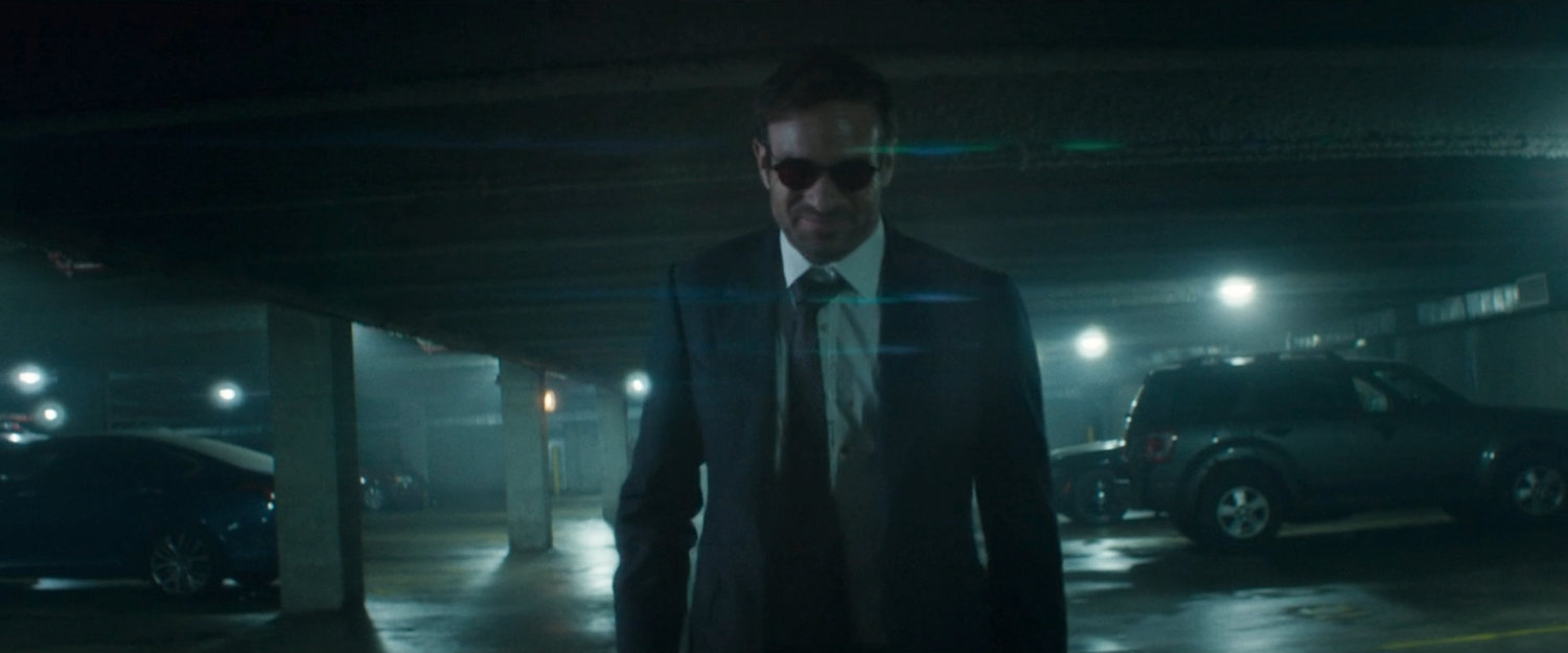 Matt walking through the underground parking level at the City Courthouse.