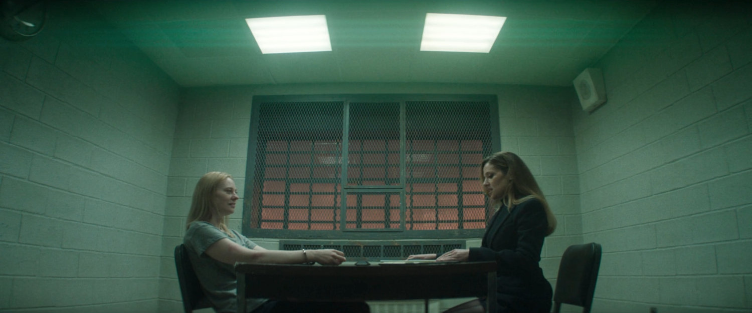 Karen being interviewed by Heather in a 15th Precinct Interrogation room.