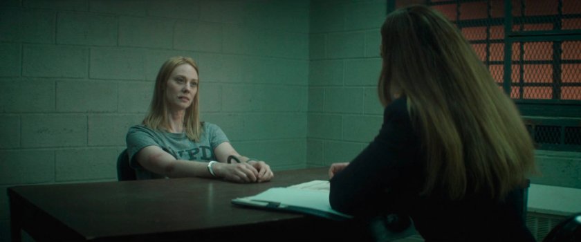 Karen being interviewed by Heather in a 15th Precinct Interrogation room.