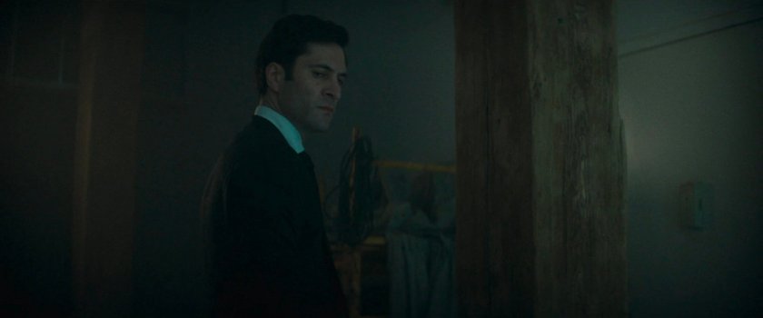 Buck looking back inside 350 Spring Street, before exiting.