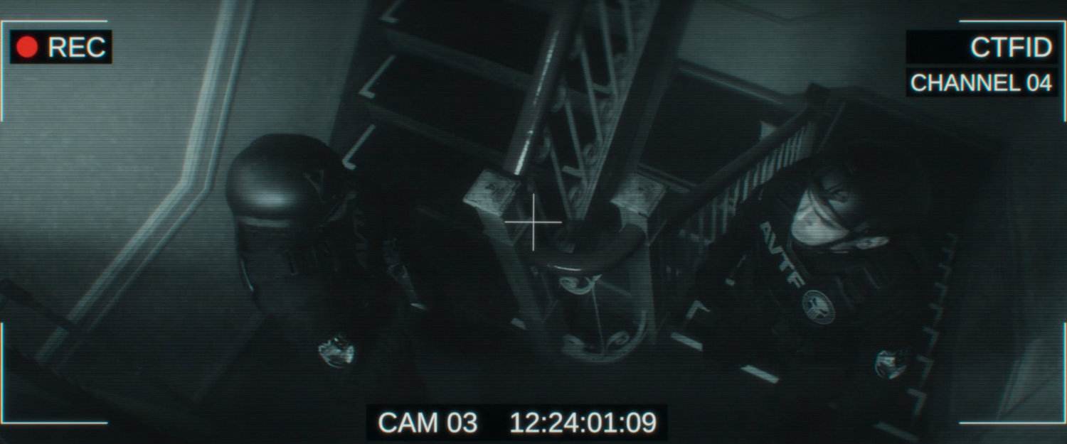 AVTF agents inside the stairway of a building across the street from the city courthouse.