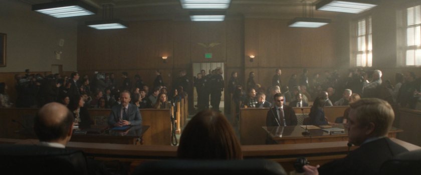 A crowded city courtroom.