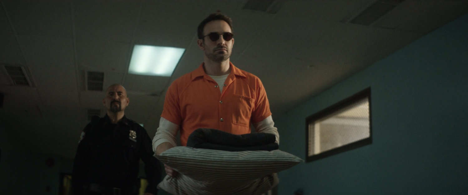Matt walking along a hallway in Ryker's Penitentiary.