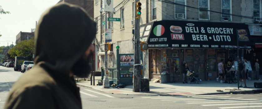Frank crossing an intersection in Little Sicily.