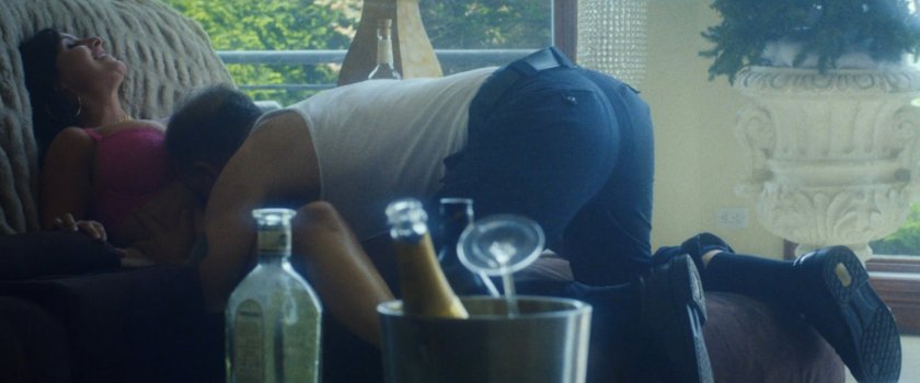 Bobby Gnucci and a woman making love in a house.
