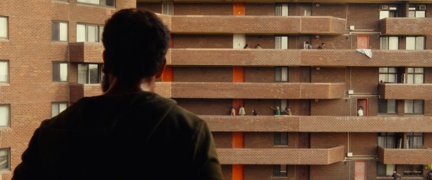 Frank watching criminals attack his neighbors at his apartment building.