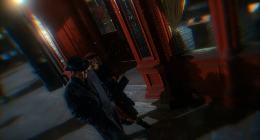 Ben and Ruby walking past a jewelry store.