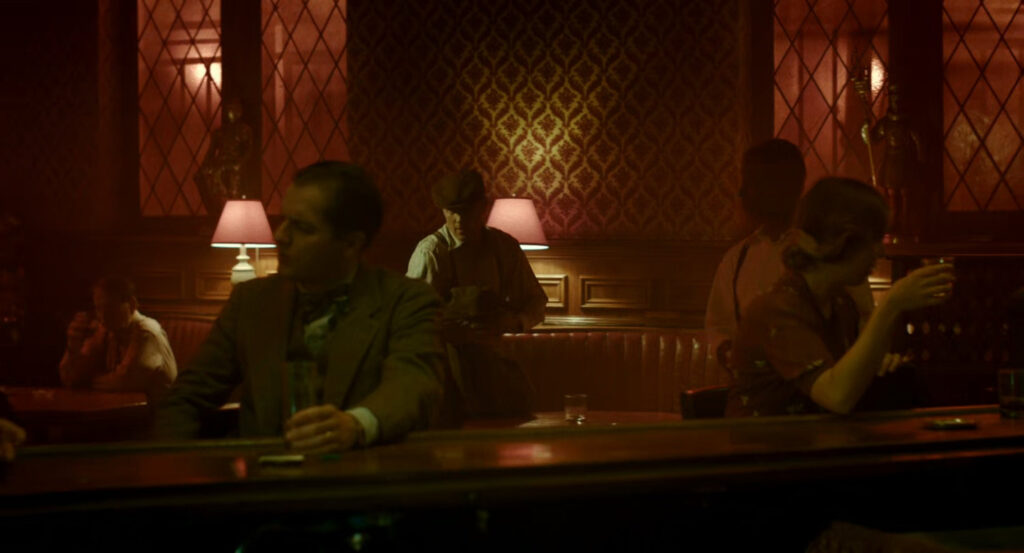 Addison inside of a New York bar.