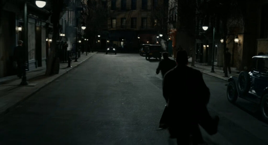 Ben chasing Addison along a dark street.