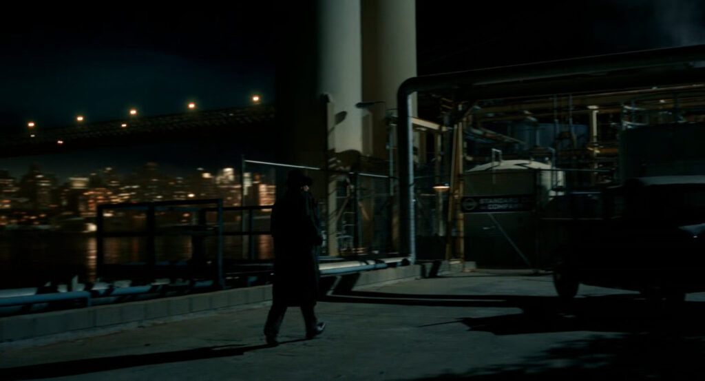 Ben running towards a Standard Oil refinery.