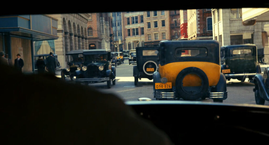 Donegal following Winston's car on a busy New York street.