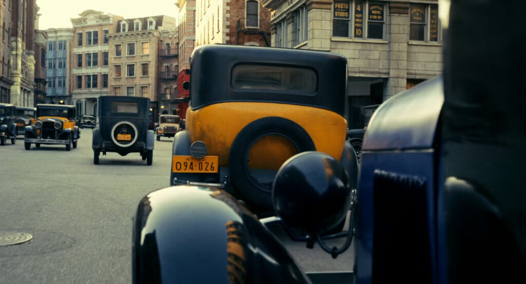 Donegal following Winston's car on a busy New York street.