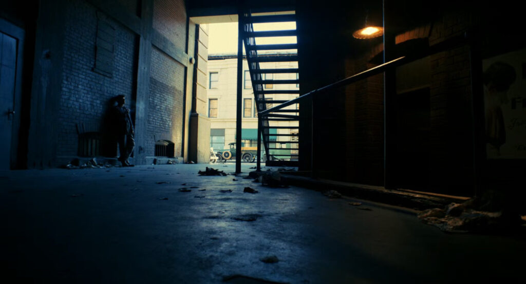 Exterior of alley entrance to New York bar.