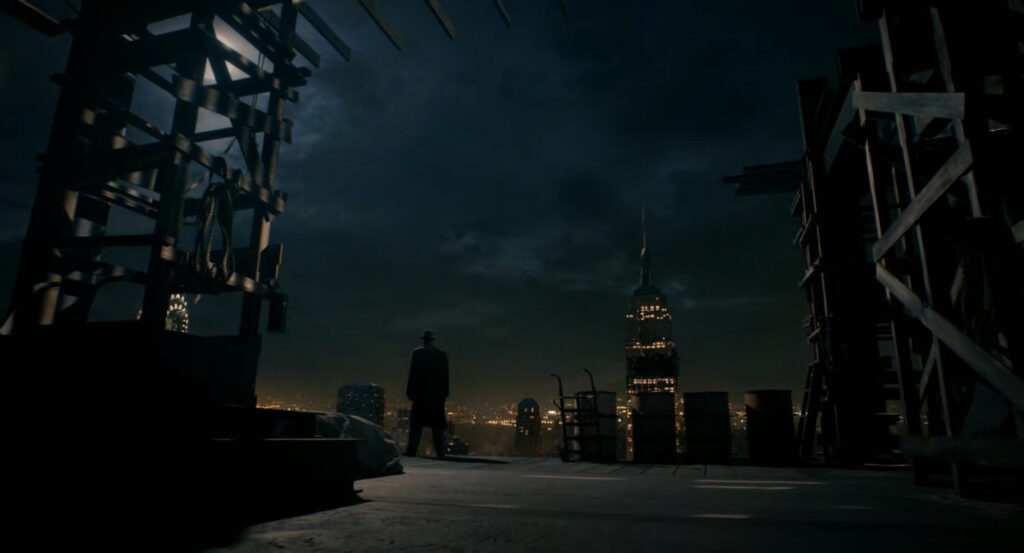 Ben standing on an under construction floor of a building at night.