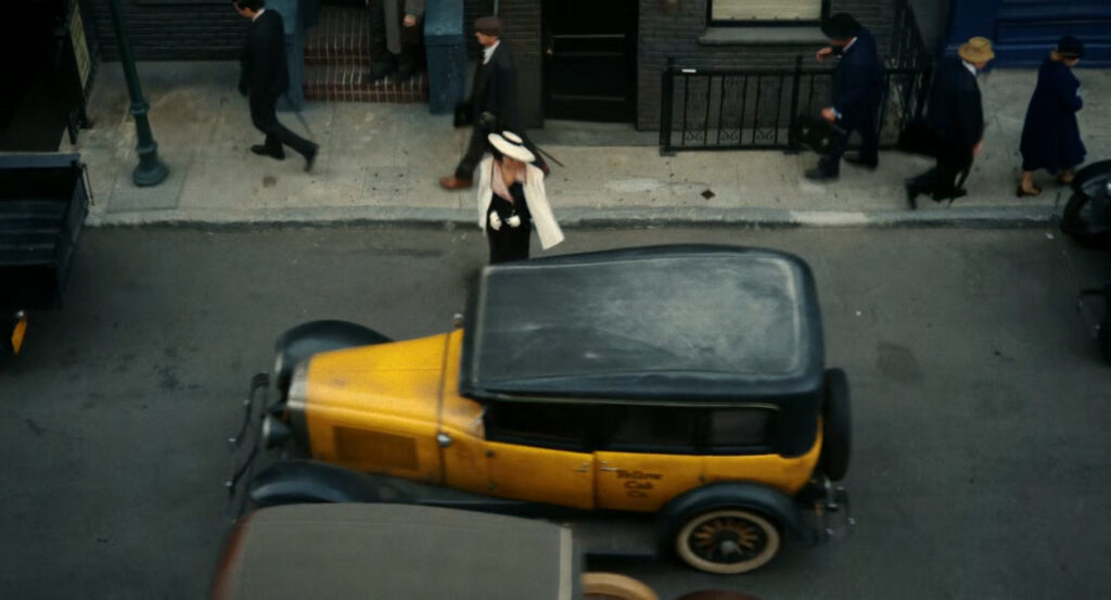 Cat getting into a cab in the street below Ben's office.