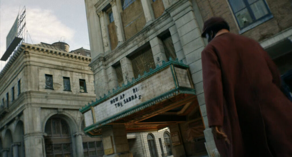 Lonnie outside an old theater.