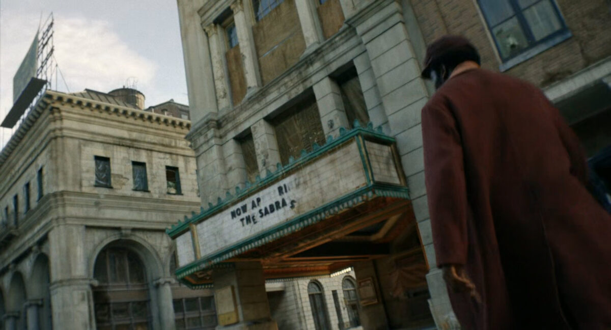 Lonnie outside an old theater.