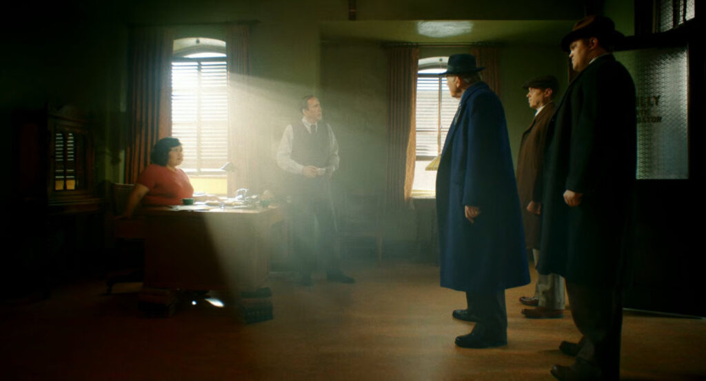 Silverman, with Perry and Pudge, inside Reilly Investigations with Ben and Janet.