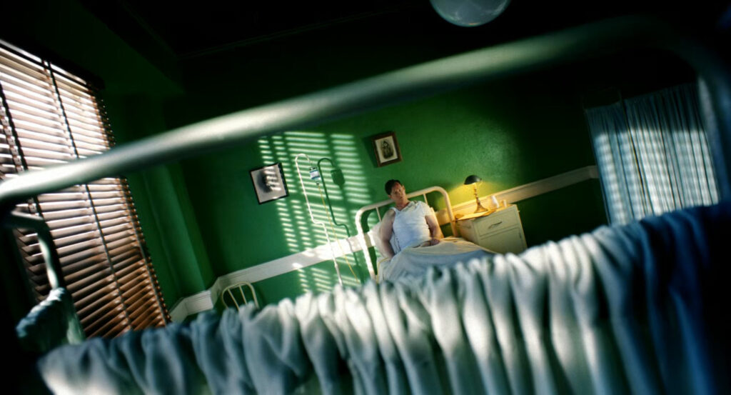 Police officer in a hospital room.