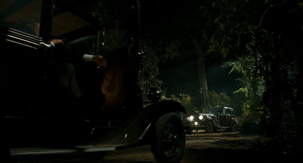 Silvermane's car arriving in the woods.