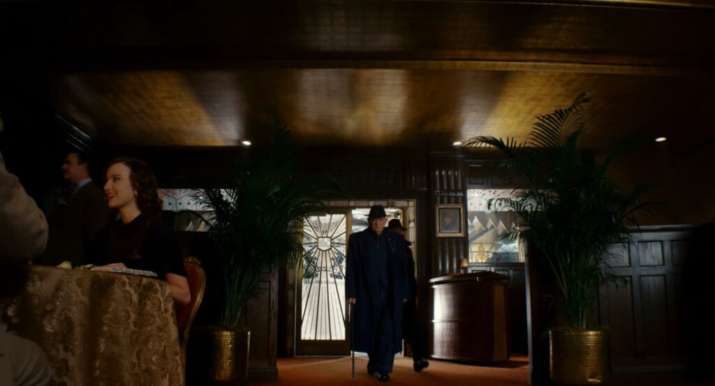 Silvermane entering a restaurant club.